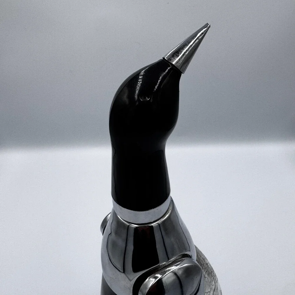 PENGUIN BOTTLE DECANTER MUSIC BOX PLAYS 